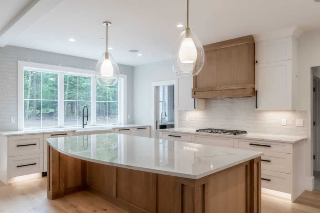 Kitchen with oak cabinets and a large island