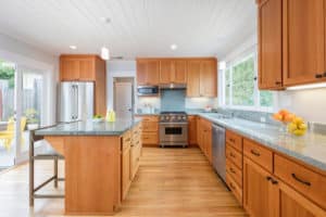 All wood kitchen cabinets and wood flooring