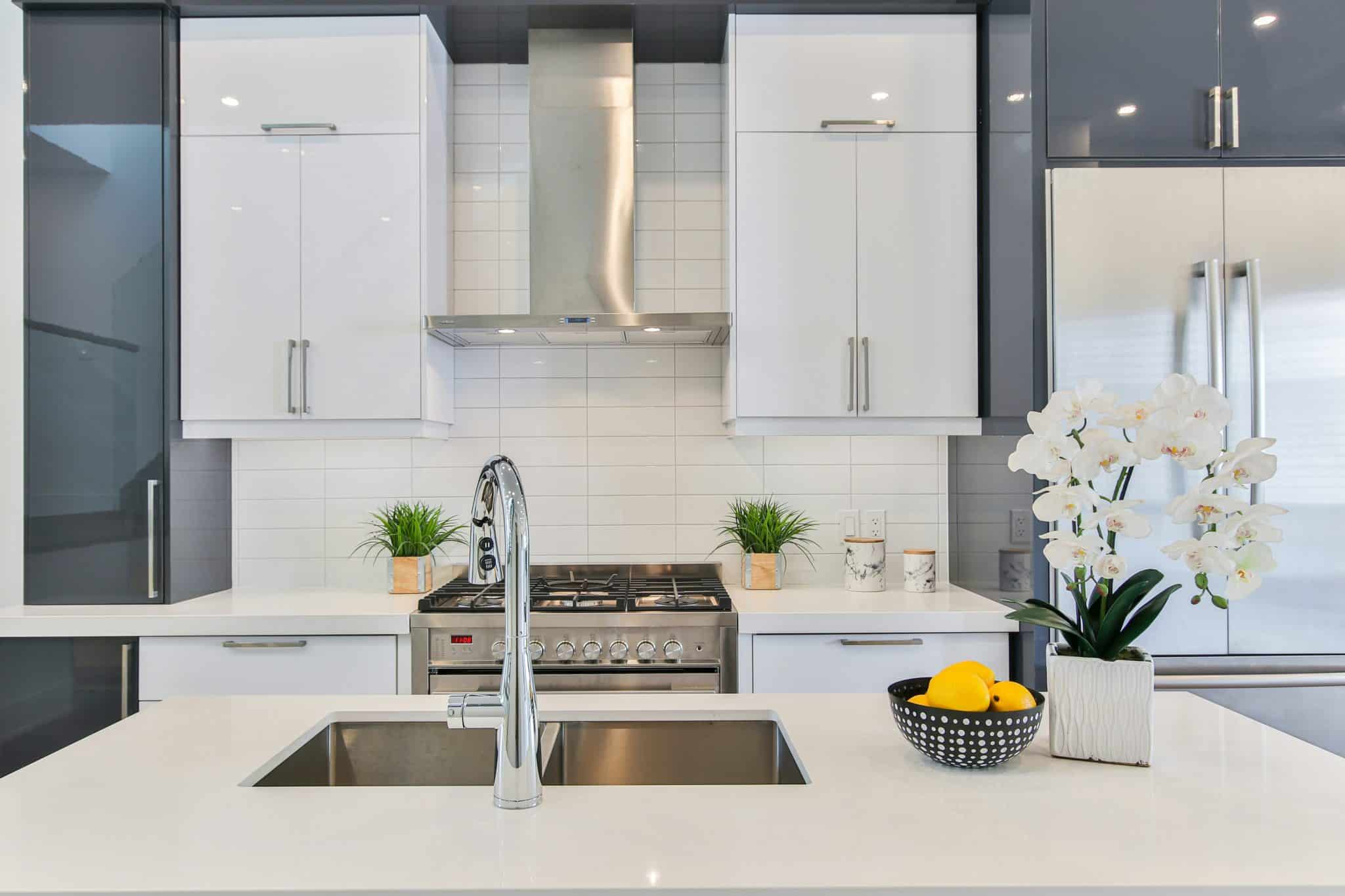 Small kitchen storage idea with modern white cabinets